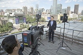 AP's backdrop for a live stand-up TV broadcast in Beijing, China.
