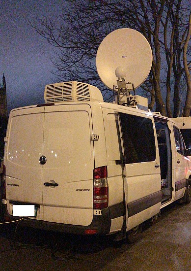 SNG satellite truck for sale with antenna up.